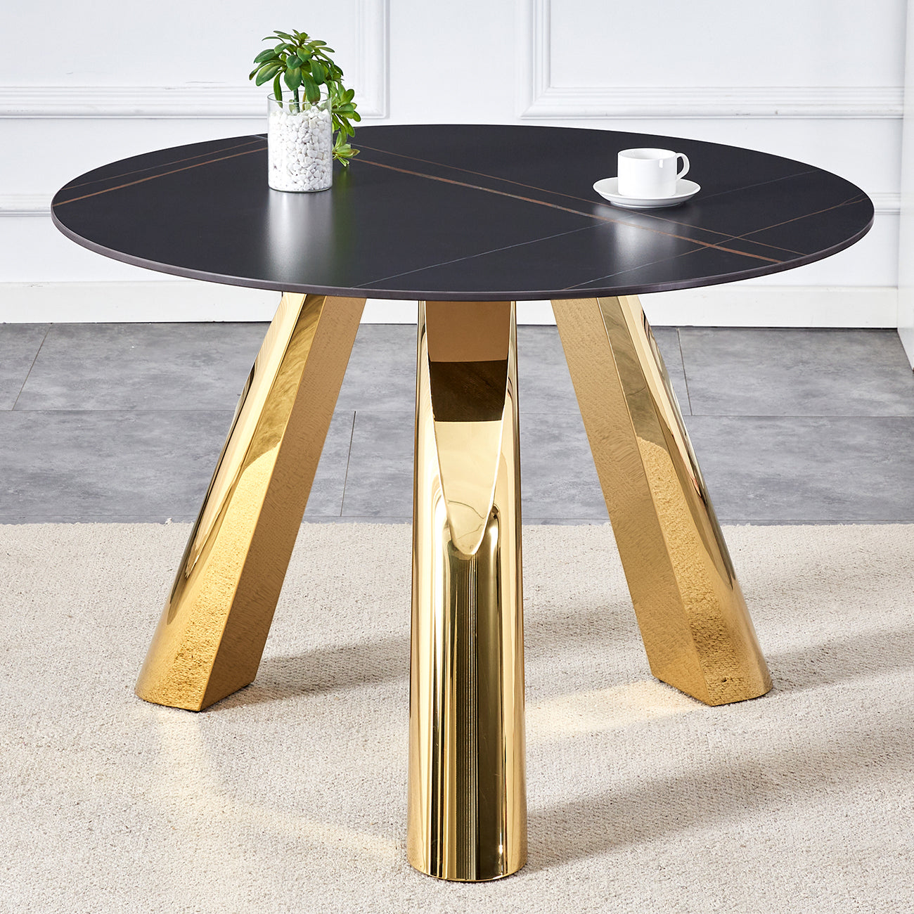 The 42-inch stainless steel gold-plated flamed granite round table with seating for 4 or 6 people is perfect for dining, entertaining, or as a conference table