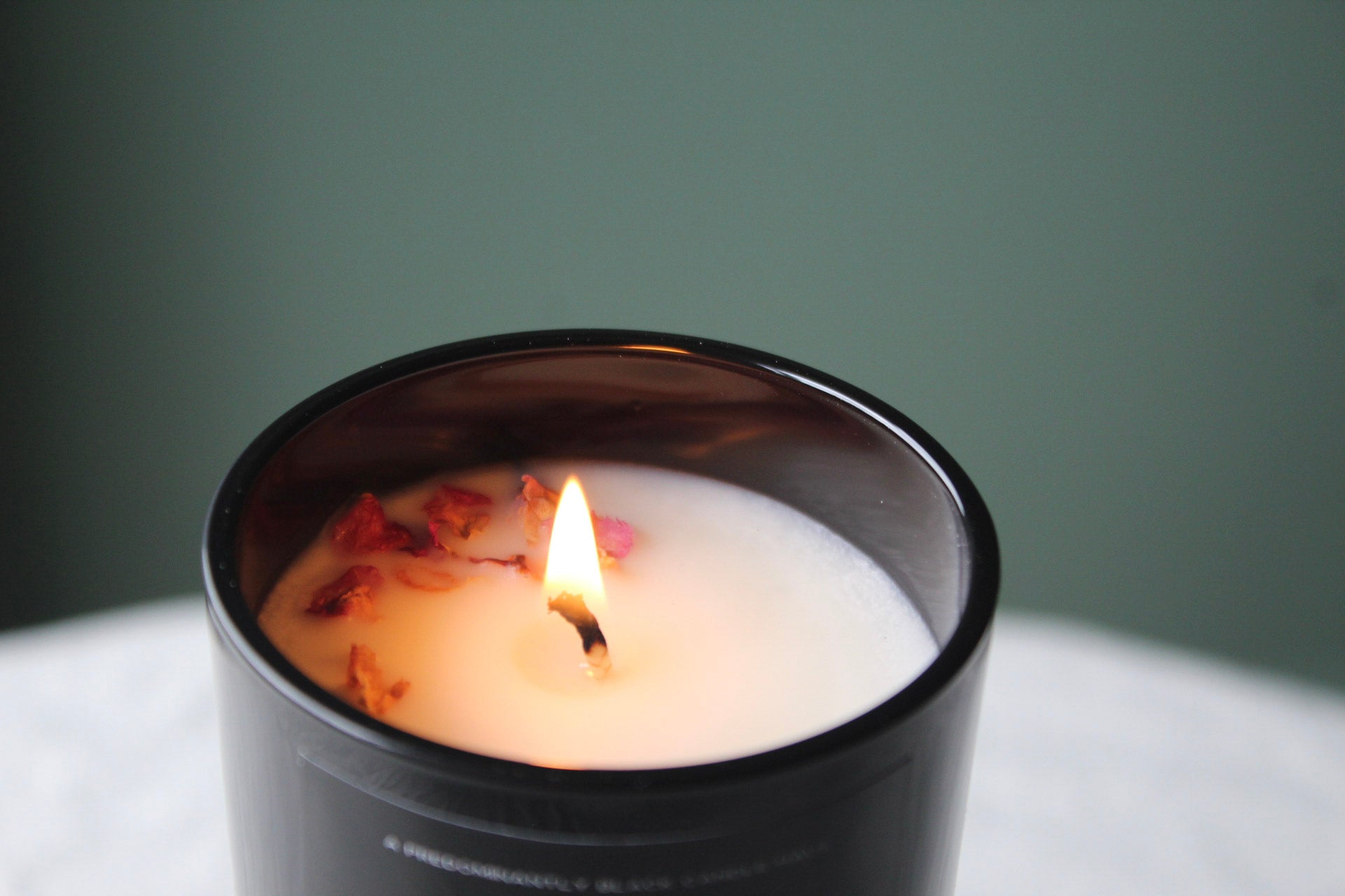 AN OPULENCE CANDLE