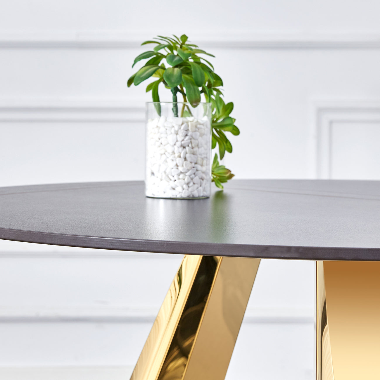 The 42-inch stainless steel gold-plated flamed granite round table with seating for 4 or 6 people is perfect for dining, entertaining, or as a conference table