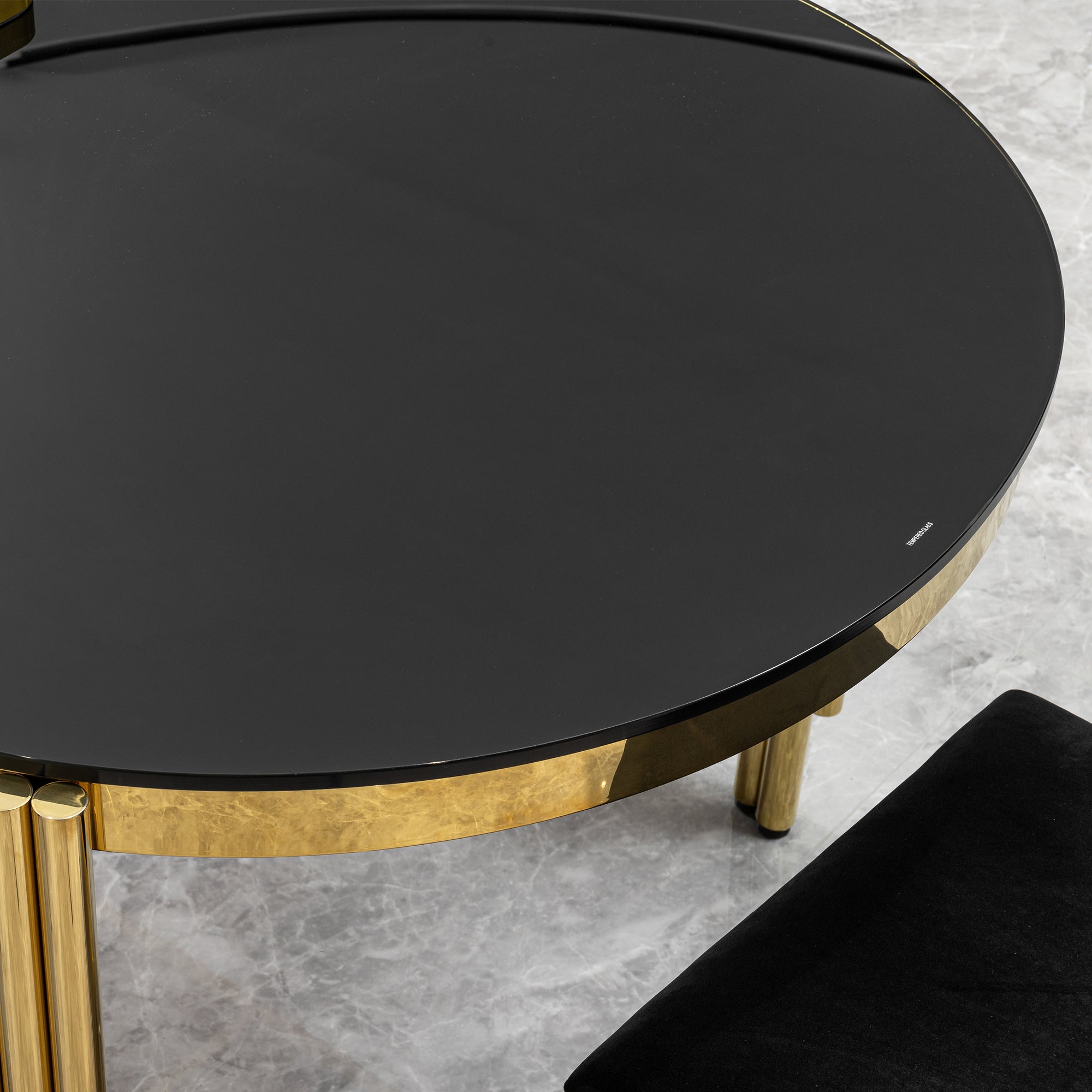70.08 in. Oval Dining Table with Black Glass Top and Gold Stainless Steel Base, for 6 Seats