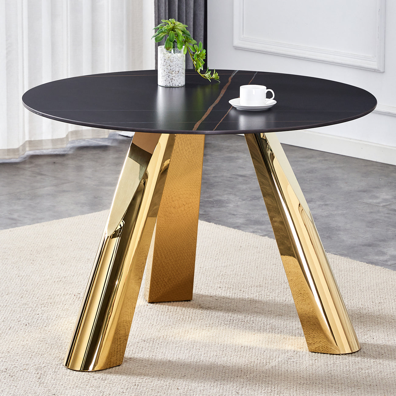 The 42-inch stainless steel gold-plated flamed granite round table with seating for 4 or 6 people is perfect for dining, entertaining, or as a conference table